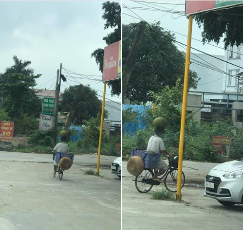 Phát hiện &quot;cao thủ&quot; đầu đội mít siêu to khổng lồ, chân đạp xe cực lụa khiến cộng đồng mạng trầm trồ &quot;Người thông minh phải biết sử dụng cái đầu&quot;